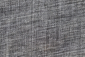 the abstract surface of the woven fabric in grey for a background pattern. a detailed element graphic for a creative design.