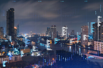 FOREX graph hologram, aerial night panoramic cityscape of Bangkok, the developed location for stock...