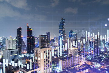 FOREX graph hologram, aerial night panoramic cityscape of Bangkok, the developed location for stock market researchers in Southeast Asia. The concept of fundamental analysis. Double exposure.