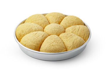 Turkish dessert halva in metal tray isolated on white