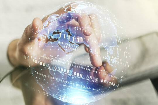 Multi exposure of abstract programming language hologram with world map and hand working with a digital tablet on background, artificial intelligence and neural networks concept