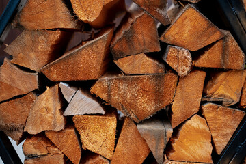 Side view of stacked wood logs for a background