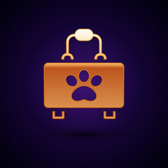 Fototapeta premium Gold Pet first aid kit icon isolated on black background. Dog or cat paw print. Clinic box. Vector