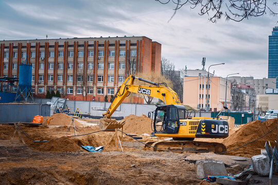 Minsk, Belarus. Apr 2020. JCB Tracked excavator JS205lc at construction site. JCB industrial earthmover, excavation work. Earth moving heavy duty vehicle. Earthwork with heavy machinery