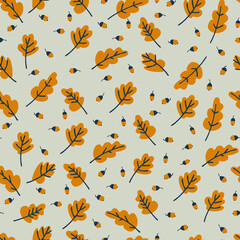 Seamless pattern with yellow oak leaves and acorns on light-colored background. Autumn concept. For surface design and other design projects