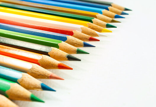 Front view image of various colored pencils. placed on a white background and colored pencils in close-up.Concept art  Text copy space and office
