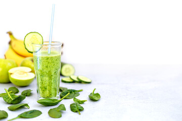 Spinach, apple, banana and cucumber smoothie. Detoxification of the body. Healthy eating.