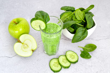 Green spinach, apple and cucumber smoothie. Detox the body. Healthy eating.