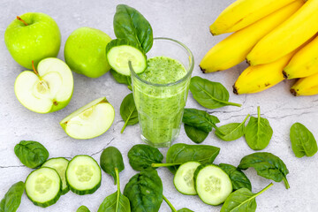 Spinach, apple, banana and cucumber smoothie. Detoxification of the body. Healthy eating.