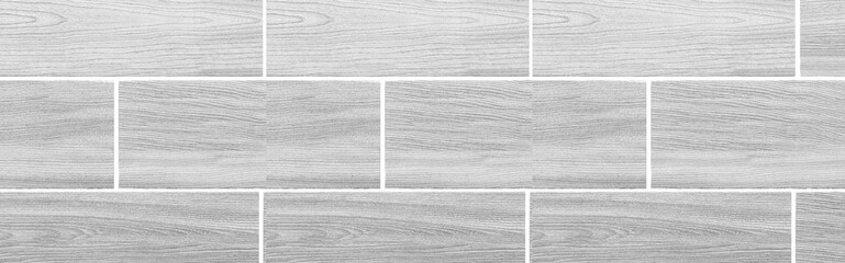 Panorama of Wood grain white ceramic floor tile pattern and texture background seamless