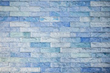 Blue brick wall texture and background.