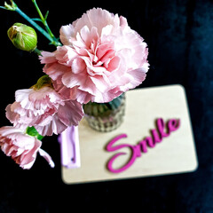 Smile with carnations