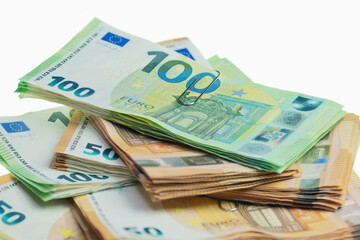 A stack of bundled euro banknotes
