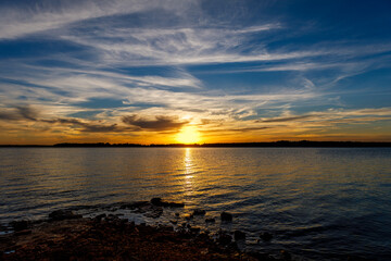 Beautiful cloudy sunset at Thunderbird lake.