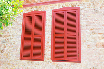 Fototapeta premium wooden windows on the facade of the building