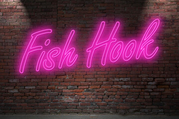 Neon Fish Hook lettering on Brick Wall at night