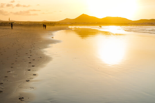 Famara beach at sunset, famous surfing beach in Lanzarote, Canary Islands, Spain.