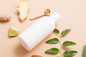 Natural cosmetic products on a light beige background. Cosmetic jar mockup.
