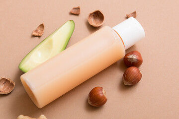 Natural cosmetic products on a dark beige background. Cosmetic jar mockup.