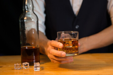 Barman pouring whiskey whiskey glass beautiful night