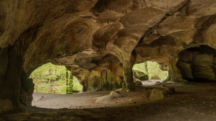 inside millstone cave Hohllay in the forest Mullerthal, Berdorf, Luxembourg