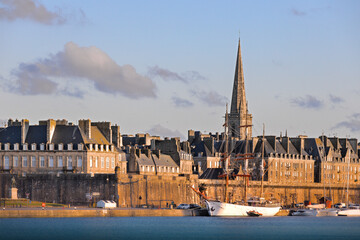 Sun rises over Saint Malo - obrazy, fototapety, plakaty