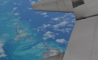 Naklejka na ściany i meble Bahama Island view from airplane window