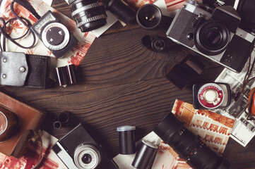 Old outdated cameras, lenses and exposure meters