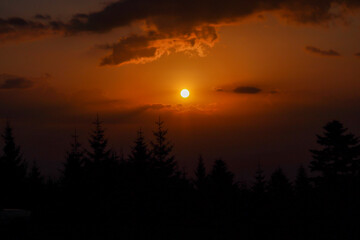 Obraz premium sunset over the river