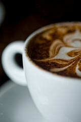 Coffee cup and coffee beans at a coffee shop. Still details. High quality photo