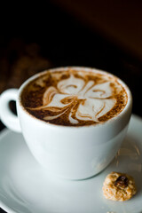 Coffee cup and coffee beans at a coffee shop. Still details. High quality photo