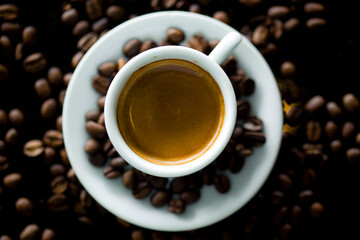 Coffee cup and coffee beans at a coffee shop. Still details. High quality photo