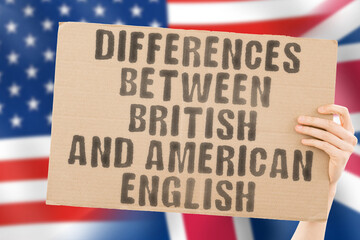 The phrase " Differences between British and American English " on a banner in men's hand. Communication. Deal. Dialogue. Improve. American English. British flag. Learning English. Variation. Variety