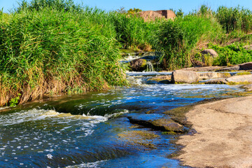 View of Tokovsky waterfalls on the Kamenka river in Dnipropetrovsk region, Ukraine