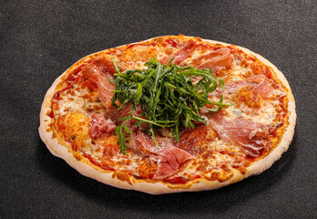 Pizza with parma and rucola