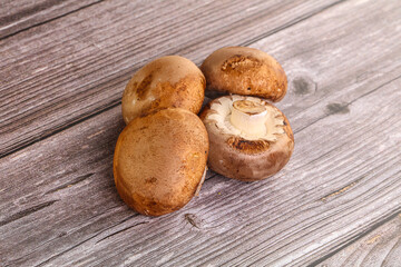 Raw brown champignons mushroom heap