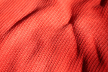 Red material background. Vivid red cloth background.