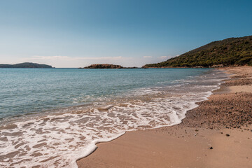 The secluded beach of Plage de Chiuni and turquoise Mediterranean sea on the west coast of Corsica