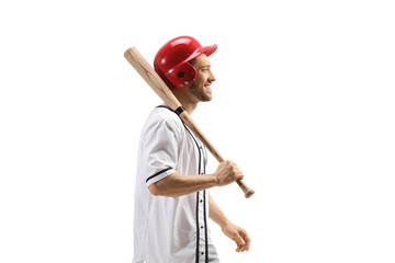 Profile shot of a man with a baseball bat and a helmet