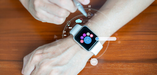 Close-up of a smart watch on a man's wrist with a social networking app on the screen. Modern stylish and innovation wearable device
