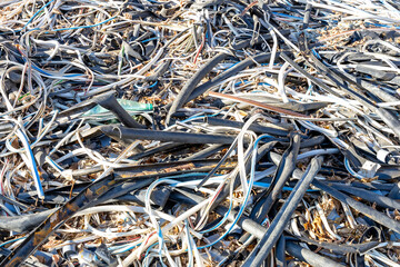 Illegal dump with remnants of electrical insulation removed from old aluminum and copper wires....