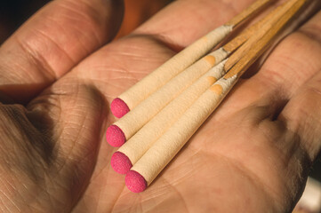 Hunting matches in hand. A special means of kindleing a fire in field conditions. Equipment for hunting and tourism