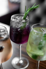 Aperitif is a refreshing cocktail of lemonade made from citrus slices. Soft drink with syrup and soda and ice cubes. Concept - summer thirst