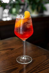 Aperitif is a refreshing cocktail of lemonade made from citrus slices. Soft drink with syrup and soda and ice cubes. Concept - summer thirst