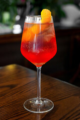 Aperitif is a refreshing cocktail of lemonade made from citrus slices. Soft drink with syrup and soda and ice cubes. Concept - summer thirst