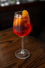 Aperitif is a refreshing cocktail of lemonade made from citrus slices. Soft drink with syrup and soda and ice cubes. Concept - summer thirst