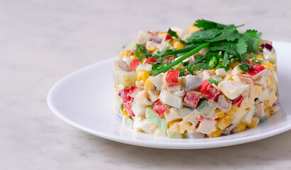 salad of crab sticks and corn, on a marble table, horizontal, no people,