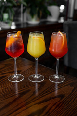 Aperitif is a refreshing cocktail of lemonade made from citrus slices. Soft drink with syrup and soda and ice cubes. Concept - summer thirst