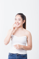Asian woman is showing off pretty skin. Asian beauty skin care woman looking at side.