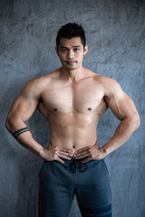 Portrait of asian man big muscle at the gym,Thailand people,Workout for good healthy,Body weight training,Fitness at the gym concept